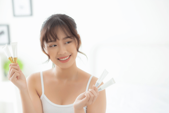 image of woman comparing acne medicines